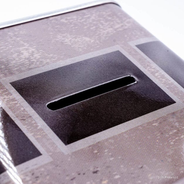 Coin slot on the top of the Han Solo Metal Locker Tin.