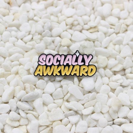 Enamel Pin with words "Socially Awkward" in pink and yellow.